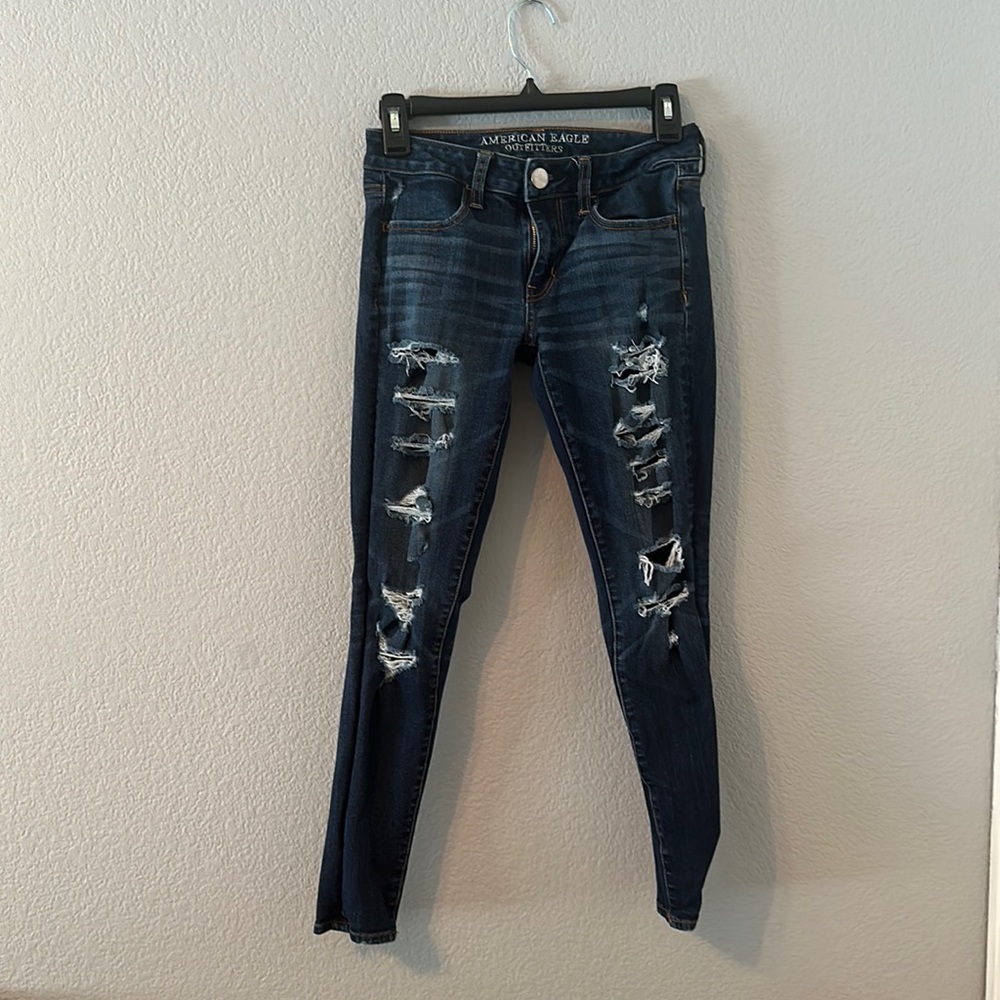 American Eagle Outfitters dark wash women’s jeans with rips in size 2
